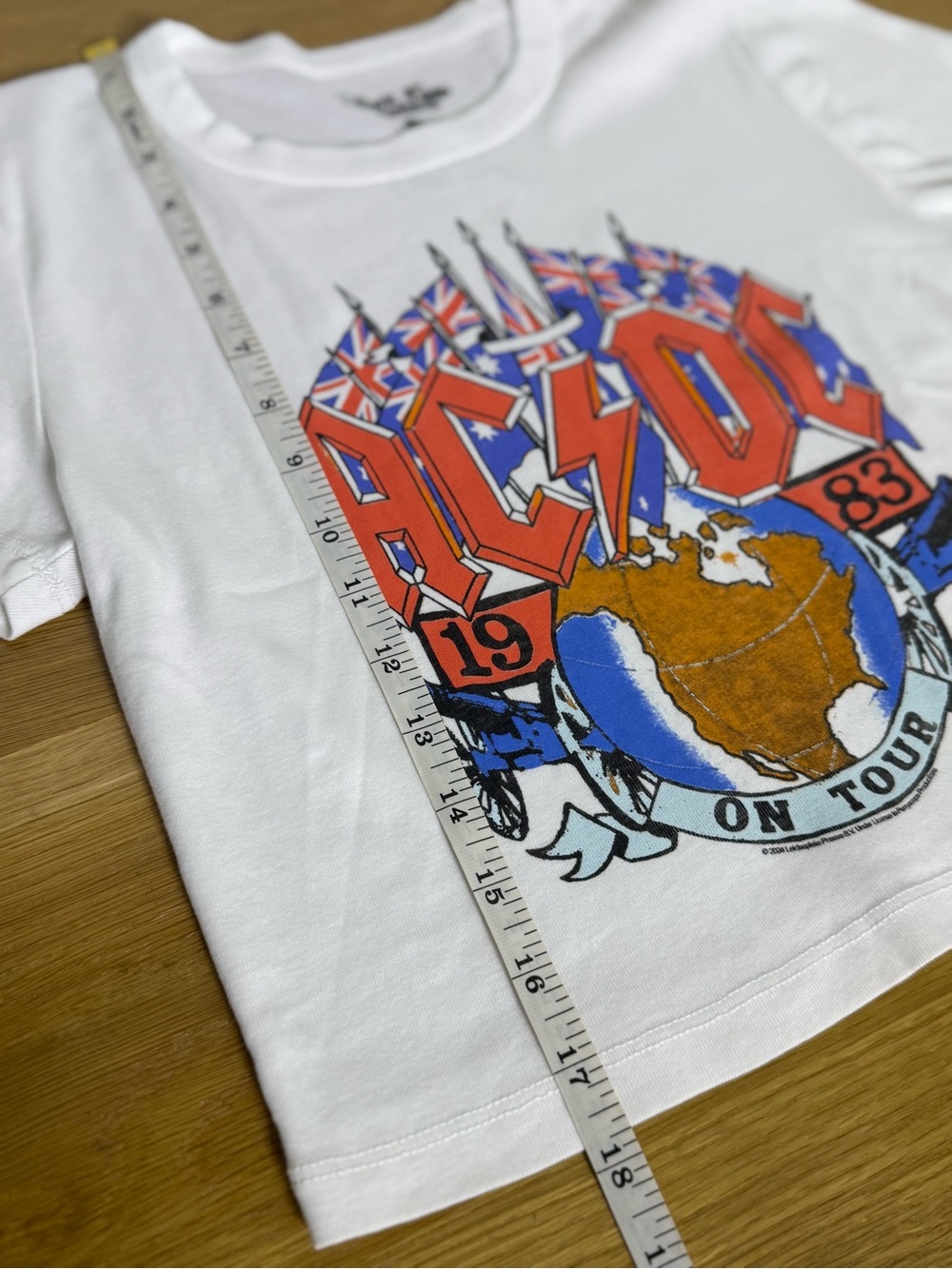 Junk Food Clothing AC/DC 1983 On Tour White Graphic Cropped Baby Tee - Picture 5 of 9